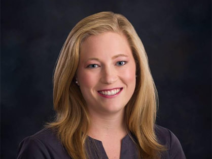 Image of Jenna Cooper, PC-C smiling